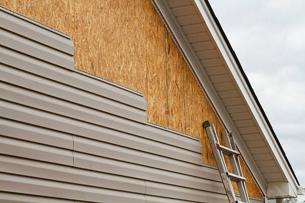 Professional Storm Damage Siding Repair technician working in Windsor Locks, CT